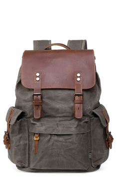 The Stone Creek Backpack is perfect for an adventure-packed day or school day. . Top carry handle. Padded adjustable backpack straps. Drawstring closure with foldover flap. Interior features include laptop compartment with secure strap, pen/pencil slots, 5 slip pockets, keychain ring, and 2 zip pockets. Handcrafted. Approx. 18" x 12" x 5". Approx. 3" handle drop; 24" strap drop. Imported  This item cannot be shipped to Canada. Exterior: cotton canvas, leather, recycled hardware, vegetable base d Outdoor Brown Backpack With Adjustable Straps, Brown Outdoor Backpack With Adjustable Straps, Canvas Satchel Backpack For Adventure, Canvas Bags For Back To School And Outdoor Activities, Casual Waxed Canvas Backpack For Outdoor, Travel Backpack With Adjustable Straps In Canvas, Travel Backpack With Adjustable Strap In Waxed Canvas, Travel Backpack In Waxed Canvas With Adjustable Strap, Casual Waxed Canvas Backpack For Adventure