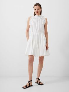 Emily Tiered Flared Dress Summer White | French Connection US A-line Mini Dress With Ruffle Hem For Daywear, Tiered Mini Dress For Daywear, Summer Tiered Dress With Ruffled Skirt, Mini Length, Mini Tiered Dress With Ruffled Skirt For Summer, Summer Mini Tiered Dress With Ruffled Skirt, White Tiered Skirt Mini Dress For Daywear, Chic Mini-length Tiered Daywear Dress, Chic Tiered Mini Dress For Daywear, Chic Mini Length Tiered Dress For Daywear