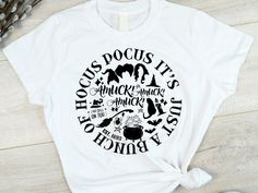 a white t - shirt with black lettering on it that says hockie pocus