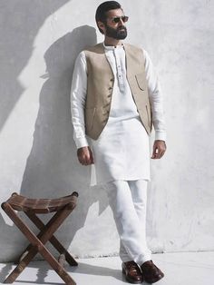 Tailored White Vest For Semi-formal Occasions, Sleeveless Vest With Buttons For Wedding, Elegant Wedding Vest With Buttons, White Sleeveless Formal Suit, Beige Sleeveless Semi-formal Vest, Classic Nehru Jacket For Wedding, White Sleeveless Suit For Wedding, Tailored Sleeveless Suit For Wedding, Tailored Sleeveless Three-piece Suit For Wedding