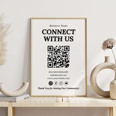 a poster with a qr code on it next to vases and other items