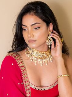 Indian bridal set makes every bride's outfit perfect. Clear Kundans adorn a hammered gold plated metal alloy. Beautiful grey shaded coating makes this bridal set special. This grey jewelry set is sure to make you stand out from the crowd. This necklace set comes along with a beautiful pair of Jhumka earrings & maang tikka with Kundan to match. Our Bridal collection is handmade with love & care. It makes us super happy to be part of your special day. The approximate earrings length is 3.5". SET I Elegant Dual-tone Chandbali Jewelry Sets, Gold Festive Sets For Marriage, Silver Bridal Sets For Diwali Celebration, Dual-tone Kundan Bridal Necklace For Celebration, Kundan Chandbali Bridal Sets For Celebration, Kundan Bridal Sets With Chandbali Shape For Celebration, Chandbali Kundan Bridal Sets For Celebration, Bollywood Kundan Necklace With Cutdana For Marriage, Chandbali Kundan Necklace For Marriage