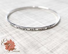 "This sterling silver engraved bangle bracelet in made by hand, formed, personalized and polished. It has a slightly rounded surface that will be laser engraved with the message of your choice (up to 65 characters, counting spaces and punctuation). This is a great layering piece (stacks well with many of my other lovely silver bangles!). Bracelet will arrive neatly packaged and ready to wear and enjoy, or give as a gift! {WHAT * YOU * WILL * GET} - - - - - - - - - - - - - - - - - - - - - - - - Bangle is made by hand, engraved and polished. * (1) sterling silver bangle (MAXIMUM 65 characters, counting spaces and punctuation) All items can only be engraved on one side unless otherwise noted above. Each piece is individually handmade using special tools. Text may not always line up perfectly Engraved Bangle Bracelet, Engraved Bangle, Medic Alert Bracelets, The Bangles, Sterling Silver Bangle, Sterling Silver Bangles, Silver Bangle, Silver Pieces, Punctuation