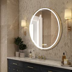 a bathroom vanity with a round mirror above it