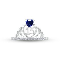 Make her feel majestic on her special day with this sparkly crown ring crafted in sterling silver. A heart-shaped blue lab-created sapphire – the birthstone of September – shines atop the design. The number 15 gleams inside the heart-shaped center, while a line of white lab-created sapphires shimmer on the band to finish the look. Blue Jewelry For Birthday And Valentine's Day, Cubic Zirconia Birthstone Ring For Birthday, Elegant Blue Rings For Birthday, Silver Jewelry For Sweet 16 And Valentine's Day, Blue Birthstone Ring For Birthday, Quinceanera Crown, Number 15, Quince Ideas, White Lab