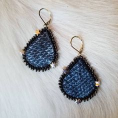 These hand dyed salmon leather earrings are made from locally harvested sockeye salmon on Dena'ina and Ahtna land, using a process taught to me by indigenous artist Hanna Sholl (visit https://www.fineartsbyhannasholl.com) who I had the honor of meeting at Alutiiq culture camp.  This item is a product of indigenous knowledge that was gifted to me.  I am not an indigenous artist.  I encourage all persons to support indigenous artists producing similar work, such as: HeyChickadeeCrafts, Saltydoglyn Handmade Blue Leather Earrings, Festival Handmade Leather Earrings, Handmade Leather Earrings For Festivals, Artisan Hand-stitched Festival Jewelry, Indigenous Knowledge, Salmon Skin, Sockeye Salmon, Beaded Earring, A Hook