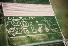 an aerial view of a field with writing on it