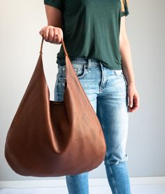 LEATHER SHOULDER BAG is made of 100% high quality natural leather. Very practical for carrying on the shoulder. The purse closes with a magnetic closure. Inside there is one zippered pocket. To be worn on the shoulder or in the hand. Accommodates A4 format (US Lettel format). Spacious interior provides room for all the daily essentials. This bag is perfect as your everyday bag, which can fit an IPAD, A4 files (US Lettel files), books, magazines, cosmetic bag as well as many accessories. Main fea Natural Leather Bag, Soft Leather Handbags, Everyday Tote Bag, Large Leather Tote Bag, Everyday Purse, Handbag For Women, Large Leather Tote, Hobo Bags, Brown Leather Bag