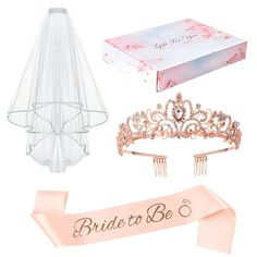 the bride to be tiara and hair combs are on display with pink ribbons