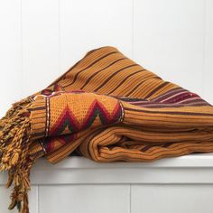 This is an authentic vintage textile from Nigeria, purchased in South Africa.  It has rich color of dark mustard yellow, burgundy and black in a heavy thick woven cloth made on looms by the hands of the African people. This is an heirloom piece that can be passed from generation to generation.  It is beautiful and durable. The age of this piece is a guess. Traditional Brown Shawl With Patterns, Traditional Brown Shawl With Woven Motifs, Traditional Brown Shawl For Festival, Traditional Brown Handloom Shawl, Traditional Handwoven Shawl For Festival, Bohemian Handloom Shawl For Traditional Ceremonies, Dark Mustard Yellow, Kente Cloth, Wedding Blankets