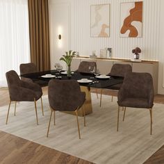 a dining room table with chairs and plates on it