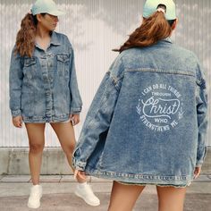 Scripture Women's oversized denim jacket with back side print, designed to celebrate faith in style. The powerful verse "I can do all things through Christ who strengthens me."(Philippians 4:13) written in trendy typhography style, reminds us that no challenge is too great when we draw strength from our faith in Christ. So whether you're facing a difficult day, pursuing your dreams, or simply need a reminder of the divine support available to you, this jean jacket will serve you as a daily invit Denim Jacket With Letter Print For Streetwear, Streetwear Denim Blue Denim Jacket With Letter Print, Casual Denim Jacket With Letter Print For Streetwear, Casual Letter Print Denim Jacket For Streetwear, Oversized Denim Outerwear With Letter Print, Casual Denim Jacket With Letter Print In Relaxed Fit, Casual Relaxed Fit Denim Jacket With Letter Print, Casual Denim Jacket With Letter Print And Relaxed Fit, Streetwear Medium Wash Letter Print Outerwear