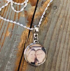 "This is a listing for ONE custom silver photo snap interchangeable charm with pendant piece on 30 inch twisted rope chain necklace 11/16\" circle photo charm I will make this to order for you. Have favorite pictures of a loved one, pet, friend, or saying? It can go on this charm! They are one sided resin sealed 18mm snap charms, and fit your other 18mm snap jewelry pieces. You will email me photo of your choosing and I will edit it for you! All is sealed permanently inside, no cheap stickers or Nickel-free Charm Necklaces For Keepsake, Silver Adjustable Charm Necklaces With Round Disc, Adjustable Silver Charm Necklace With Round Disc, Silver Adjustable Round Disc Charm Necklaces, Silver Adjustable Round Disc Charm Necklace, Personalized Round Pendant Charm Necklace With Lobster Clasp, Laser Cut Necklace, Circle Photo, Chain Link Necklace Silver