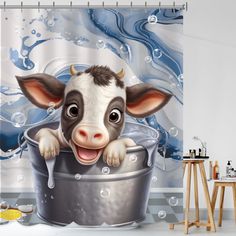 a shower curtain with an image of a cow in a bathtub and bubbles coming out of it