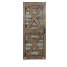 an old wooden door with metal bars on it