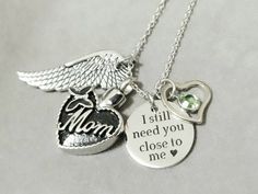 ***Memorial Necklace***Unisex design, perfect gift for anyone needing to keep a loved one close at heart.The stainless steel locket opens to allow you to place a small amount of ashes, hair or dirt... remains inside.Created with: stainless steel chain, stainless steel locket, stainless steel angel wing, stainless steel disc and swarovski birthstone.The disc engraved with "I still need you close to me" measures about 20mm in diameter.You can choose to:Add on more Swarovski birthstone charms here: Nickel-free Jewelry For Memorial On Mother's Day, Stainless Steel Jewelry For Memorial On Mother's Day, Stainless Steel Jewelry For Mother's Day Memorial, Silver Charm Necklace For Mother's Day Memorial, Stainless Steel Keepsake Necklace For Mother's Day, Mother's Day Keepsake Stainless Steel Necklace, Stainless Steel Necklace For Mother's Day Keepsake, Nickel-free Charm Necklaces For Mother's Day Keepsake, Heart Pendant Charm Necklace For Mother's Day Memorial