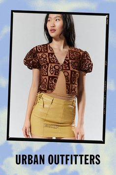 Gauzy top from House Of Suny. Designed with sheer panels throughout and cropped in a slim-fitting silhouette. Finished with puffy short sleeves and a split flyaway hem. Features House Of Sunny Casa Amor top Semi-sheer Cropped with a split-hem Button closure Content + Care 90% Nylon, 10% spandex Hand wash Imported Size + Fit Model in Chocolate is 5’9" and wearing size 4 Measurements taken from size 4 Chest: 34" Length: 17.5" | House Of Sunny Casa Amor Flyaway Top in Chocolate, Women's at Urban Outfitters Fitted Brown Crop Top With Short Sleeves, Brown Fitted Short Sleeve Crop Top, Fitted Brown Short Sleeve Crop Top, Fitted Crop Top With Short Sleeves For Night Out, Fitted Short Sleeve Crop Top For Night Out, Brown Short Sleeve Crop Top For Spring, Spring Brown Short Sleeve Crop Top, Flyaway Top, House Of Sunny