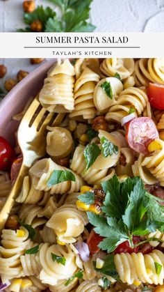 a pasta salad with tomatoes, corn and parsley