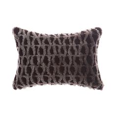 a brown and black pillow on a white background