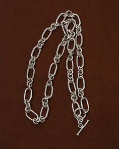 Sterling silver Approx. 29.5" long Made in Mexico Classic Chain Necklace With Sterling Silver Oval Link Clasp, Classic Silver Chain Necklace With Sterling Silver Clasp, Timeless Silver Necklace With Oval Link, Timeless Silver Oval Link Necklace, Elegant Silver Toggle Necklace With Cable Chain, Classic Sterling Silver Toggle Necklace, Silver Toggle Necklace With Oval Link And Cable Chain, Sterling Silver Toggle Necklace With Silver Clasp, Sterling Silver Chain Necklace With Solid Link