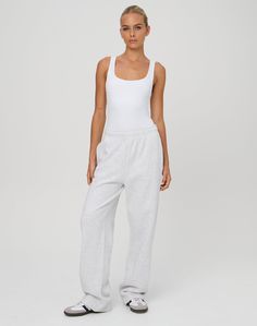 These sweatpants feature a mid rise waist, wide leg fit and an elastic waist. Relaxed Fit Full Length Sweatpants For Elevated Casual Wear, Elevated Casual Full-length Relaxed Fit Sweatpants, Sporty Activewear For Elevated Casual, Elevated Casual Full-length Sweatpants With Elastic Waistband, Full Length Sweatpants For Elevated Casual Look, Elevated Casual Sweatpants With Ribbed Waistband, Basic Sweatpants With Ribbed Waistband For Spring, Spring Athleisure Sweatpants With Straight Hem, Stretch Straight Leg Sweatpants For Elevated Casual