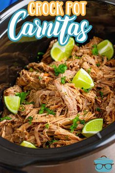 crock pot carnitas with limes and cilantro garnish