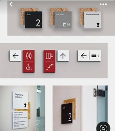 several different types of signs are displayed on the wall and below them is a door