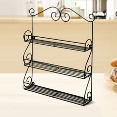 two tiered metal rack with donuts on the side