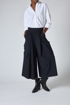 These cargo skirt pants are a fresh take on the current military cargo pants. Pair this gorgeous draped styling piece with a basic white tee for an easy weekend look, or the All Day Washable Silk blouse for a fashion-forward evening look. Click here for Petite Sizes Workwear Bottoms With Multiple Pockets For Spring, Utility Relaxed Skirt For Work, Baggy Chic Cargo Bottoms, Spring Workwear Bottoms With Multiple Pockets, Chic Baggy Cargo Style Bottoms, Bottoms With Multiple Pockets For Work, Spring, High Waist Cargo Skirt With Cargo Pockets For Work, Fall Cargo Skirt With Pockets For Workwear, Summer Workwear Cargo Skirt With Side Pockets