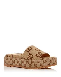 Gucci Women's Platform Slide Sandals Gucci Luxury Open Toe Sandals, Luxury Gucci Open Toe Sandals, Designer Brown Slides, Luxury Platform Slides For Summer, Luxury Open Heel Sandals For Vacation, Luxury Open Back Sandals For Vacation, Gucci Luxury Sandals With Branded Insole, Designer Platform Sandals For Vacation, Gucci Luxury Brown Sandals