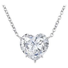 Exquisite diamond heart shape pendant necklace. This dazzling heart shape diamond weighing 2.01 carat is graded by the GIA H in color VS2 clarity. This diamond Is special and unique for being perfectly cut with an exceptional flow of translucency throughout the stone giving it an astonishing brilliance from every angle. While many heart shape diamonds aren’t a fully pronounced "heart”, This diamond is a fully pronounced heart shape attributed to it’s perfect cut. Set in our very own handmade pla Gold Open Heart Necklace, Heart Shaped Diamond Necklace, Rose Cut Diamond Pendant, Heart Shaped Diamond Pendant, Yellow Diamond Necklace, Heart Shaped Diamond Ring, Platinum Chain, White Gold Pendant Necklace, Diamond Heart Pendant Necklace