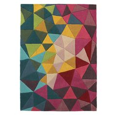 a multicolored area rug with various shapes and sizes on it, including triangles