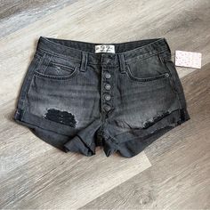 Brand New With Tags And Unworn. 5 Button Distressed We The Free Denim Shorts By Free People In Black Mambo Wash. 100% Cotton. High Rise Black Jean Shorts With Button Closure, High Rise Washed Black Bottoms With Button Closure, Washed Black Mid-rise Bottoms With Button Closure, Mid-rise Washed Black Bottoms With Button Closure, Black High Rise Shorts With Button Closure, Black Jean Shorts With Button Closure, Black Button Closure Jean Shorts, Grey Denim Jeans, Ripped Jean Shorts