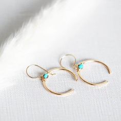 These gorgeous open circle hoops feature hand formed and hammered upside-down crescent moons with gorgeous genuine Turquoise stones secured at the top in my original bezel wrapped style.  These adorned crescents dangle beautifully from hand formed French style ear wires.  A perfect blend of modern and boho with a little Southwestern flare, these make a great addition to any collection.  Available in 14k Gold Filled , 14k Rose Gold FIlled or Sterling Silver metals  Earrings - Approx 1 1/2 inches Adjustable Crescent Jewelry, Bohemian Hoop Earrings With Moon Charm, Handmade Minimalist Crescent Jewelry, Adjustable Hoop Earrings With Moon Charm, Adjustable Moon Charm Hoop Earrings, Dainty Nickel-free Crescent Jewelry, Minimalist Semi-circle Hoop Earrings For Gift, Minimalist Semi-circle Hoop Earrings As Gift, Dainty Crescent Nickel-free Jewelry