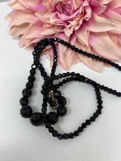 A really lovely graduated set of black beads. They are 38cm long so a nice length to wear on your dress or sit on your blouse between the jacket. Nice and shiny. For evening or day wear, a great set of beads. All beads are faceted and there is a screw clasp in good condition. They can be simply placed over the neck. In very good condition as seen. I am a trusted vintage dealer based in the U.K. You can see by my reviews that I am always truthful in my descriptions of the vintage pieces I sell, s Black Beaded Necklace, Black Bead Necklace, Vintage Pieces, Black Beads, Glass Bead, Vintage Necklace, Long Necklace, About Uk, Porter