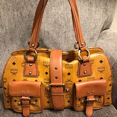 Mcm Handbag. Very Rare Style. You Can’t Just Find This Style. In Great Condition. Interior There Is Minimal Stain Not So Obvious- Check Pics. Leather Is Great, Pipings Is Great. Color Is Cogniac. Mcm Purse, Charles Jourdan, Mcm Handbags, Mcm Bags, Monogram Handbag, Black Leather Satchel, Barrel Bag, Kelly Bag, Brown Handbag