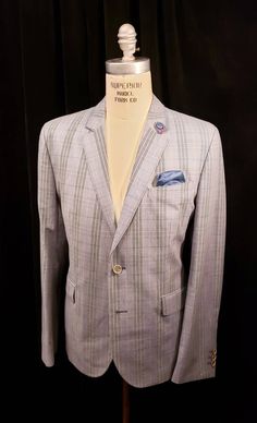 "Incredible Single Breasted Classic Style Sport Coat with wonderful detailing. Lightweight wool. Not your average sportscoat but a masterpiece by none other than Ted Baker. Bold shoulders, notch lapels, incredible coloring, complimented by beautiful bowtie interior lining. This is a perfect \"Business Attire\" must have. Great bold stripe windowpane lightweight fabric with greys, black, pink, orange, red and blue. Add your favorite vintage Fedora and hit the town. This blazer is in amazing new c Custom Fit Single Breasted Long Sleeve Suits, Custom Fit Long Sleeve Winter Suits, Tailored Single Button Sport Coat With Long Sleeves, Custom Fit Single Breasted Long Sleeve Outerwear, Fall Single-breasted Custom Fit Outerwear, Custom Fit Notch Lapel Outerwear For Winter, Semi-formal Custom Fit Long Sleeve Outerwear, Semi-formal Fitted Sport Coat With Long Sleeves, Semi-formal Custom Fit Sport Coat With Long Sleeves