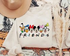 Casual Sweatshirt With Character Print For Disney Fan Events, Casual Sweatshirt With Character Print For Disney Events, Disney Letter Print Sweatshirt For Fan Events, White Letter Print Sweatshirt For Disney Fan Events, White Letter Print Sweatshirt For Disney Events, White Graphic Print Sweatshirt For Disney Fan Events, Casual Sweatshirt With Cartoon Print For Disney Fan Events, Casual Cartoon Print Sweatshirt For Disney Events, Casual Sweatshirt With Cartoon Print For Disney Events