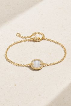 The pieces in David Yurman's 'Elements' collection make such meaningful gifts - with no beginning or end, the circular amulets depict "a timeless symbol of unity". This dainty bracelet has an 18-karat gold chain centered with lustrous mother-of-pearl encased by twinkling diamonds. Luxury Pearl Bracelet With Jewels As Gift, Elegant Pearl Bracelet With Gemstone For Gift, Elegant Pearl Gemstone Bracelet Gift, Elegant Pearl And Gemstone Bracelet As Gift, Elegant Pearl Bracelet Gift, White Round Chain Bracelet In Fine Jewelry Style, White Round Chain Bracelet Fine Jewelry, White Gold Bracelet With 17 Jewels, Gold Plated Round Pearl Bracelet For Formal Occasions