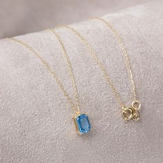 "Topaz stone, which is among the most important mines, is in the quartz group. Blue topaz is believed to promote truth and forgiveness by relaxing the soul and body. Our 14k solid gold blue topaz necklace is a stylish jewel for you and your loved ones with its elegant design. Time to pamper yourself and your loved ones... The color of those born in December is blue topaz. 🤍🤍 Special gifts for your special moments. We produce our jewelery for you in the most perfect way. 🤍🤍 All of our product Minimalist Topaz Birthstone Jewelry, Minimalist Topaz Jewelry As A Gift, Fine Jewelry Blue Topaz Birthstone Necklace For Gifts, Topaz Gemstone Necklace For Gift, Topaz Gemstone Necklace As Gift, Dainty Blue Topaz Gemstone Jewelry, Blue Topaz Minimalist Jewelry, Gold Blue Topaz Birthstone Necklace For Gift, Gold Blue Topaz Birthstone Necklace As Gift