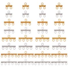 a set of nine different types of metal rail brackets with gold, silver and white rings