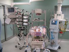 a hospital room with medical equipment in it