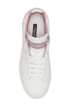 In Dolce&Gabbana's typical glamorous fashion, this low-top leather sneaker stands out with metallic-pink trim. A micro-injected rubber logo at the heel amps up the statement factor. 3/4" platform (size 38.5) Lace-up style Removable insole Leather upper and lining/synthetic sole Made in Italy Salon Shoes Luxury Pink Leather Sneakers, Luxury Pink Lace-up Custom Sneakers, Pink Sneakers With Embroidered Logo And Round Toe, Pink Low-top Sneakers With Embroidered Logo, Pink Sneakers With Embroidered Logo, Designer Custom Sneakers With White Sole, Luxury Pink Low-top Sneakers, White Sole Sneakers With Embroidered Logo, Designer Pink Leather Custom Sneakers