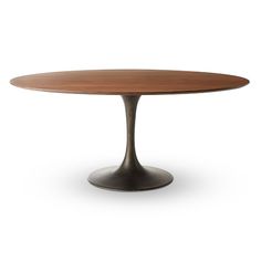 an oval wooden table with metal base on a white background in the shape of a tulip