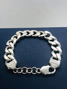 "Sterling silver 1/2\" wide flat curb link chain bracelet, 8\" long with a large lobster claw clasp. It is stamped '925 Italy' and weighs 49 grams. This bracelet is new, never been used.  All items are shipped in a pouch in a box with free gift packaging." Hook Bracelet, Alternative Jewelry, Link Chain Bracelet, Silver Chain Style, Diamond Cross Pendants, Silver Dragon, Silver Chain Bracelet, Gold Bracelet Chain, 925 Silver Jewelry