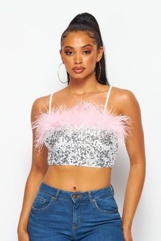 Dazzling sequins and pink feathers pave the way on this spectacular crop that's sure to be a hit from celebrations to nights on the town. • Pink Feather Trim• Adj. Straps• Pull On• Crop• Silver Sequins Sequin Crop Top, Feather Trim, Pink Feathers, Silver Sequin, Personalized Accessories, New Arrival Dress, Apparel Accessories, Feathers, Fashion Show