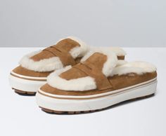 Introducing the latest addition to your sneaker collection - the Vans Style 53 Cozy Mule DX Shearling Chipmunk Sneakers Slip-On Shoes 2022. These shoes are perfect for men who enjoy athletic activities, especially skateboarding. The shoe shaft style is low top, while the color is a warm brown that matches any outfit. The shoe is made of suede material, and the shoe width is standard, providing a comfortable fit for sizes 4-10. The shoes were manufactured in Vietnam, and the product line is Vans Classic Slip-On. These sneakers are new and perfect for the upcoming year. Get your hands on them now! Mule Outfit, Estilo Vans, Fur Snow Boots, Shoes 2022, Vans Store, 2023 Trends, Vans Style, Fashion Forever, Christmas 2022