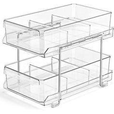 three clear drawers are stacked on top of each other