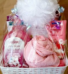 a white basket filled with lots of pink items