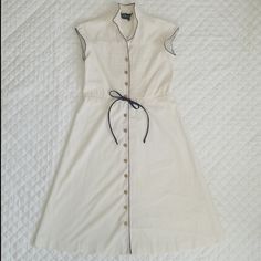 Gorgeous Bonwit Teller Vintage Off White Dress. Size "B". The Blue Attatched Belt Has No Elastic So Is Just There For Aesthetic Purposes. Cap Sleeves With Navy Blue Trim.Rustic Gold Buttons Down The Front Of Dress. No Stains, Odors, Rips Or Discoloration Noted!! Feel Free To Ask Any Questions!!! Off White Dress, Off White Dresses, Blue Trim, Off White Color, Gold Buttons, Vintage Dress, Cap Sleeves, Vintage Dresses, Blue White